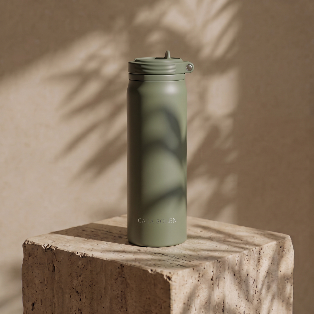 Sage green insulated drink bottle with flip lid and stainless steel bottom
