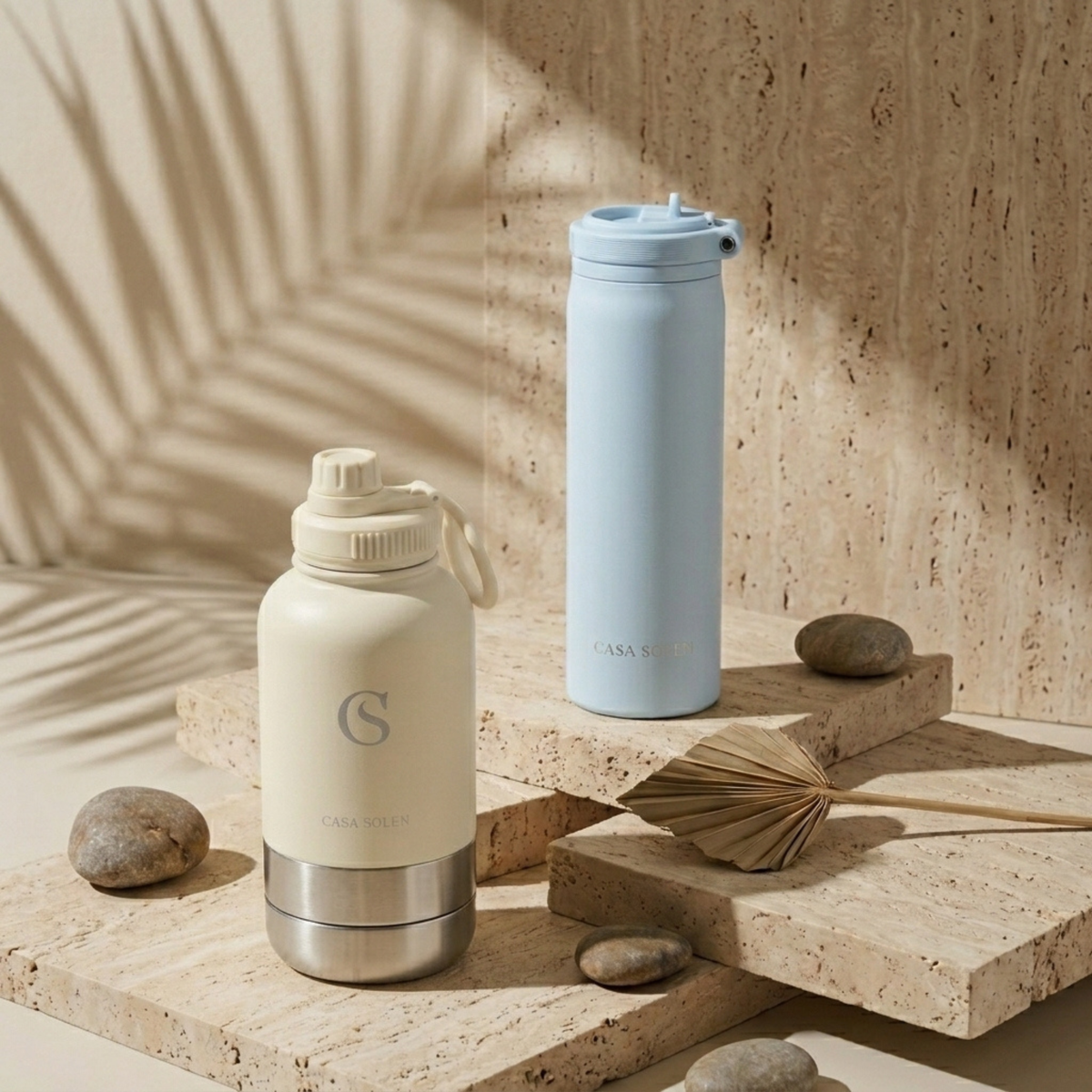 Two insulated stainless drink bottles in sky blue and cream