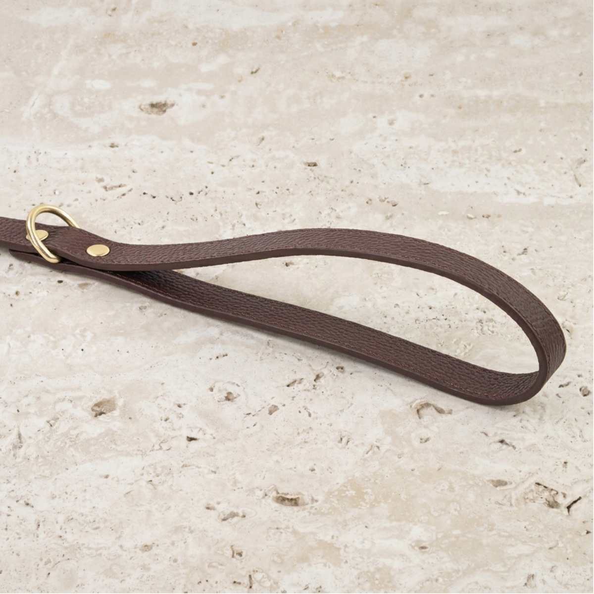 Chestnut brown leather dog leash with matte gold hardware