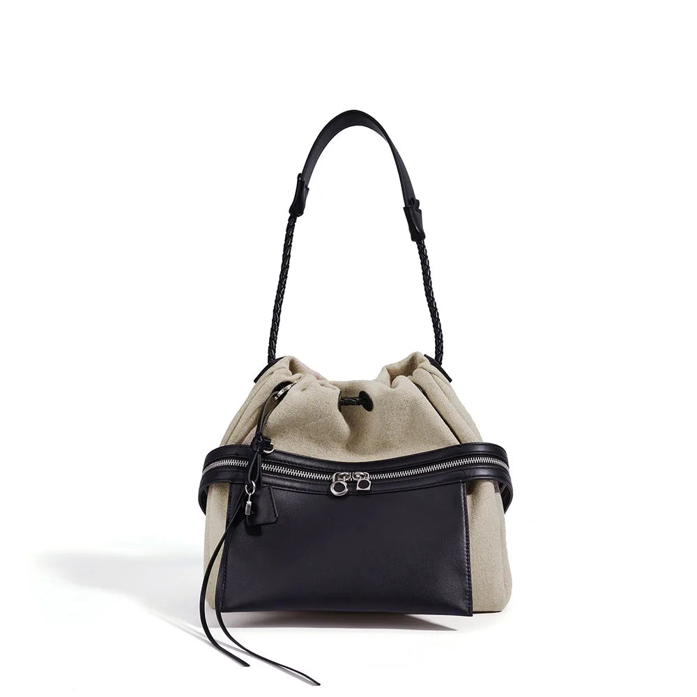 Two-tone leather bucket shoulder bag with drawstring top, clay and onyx