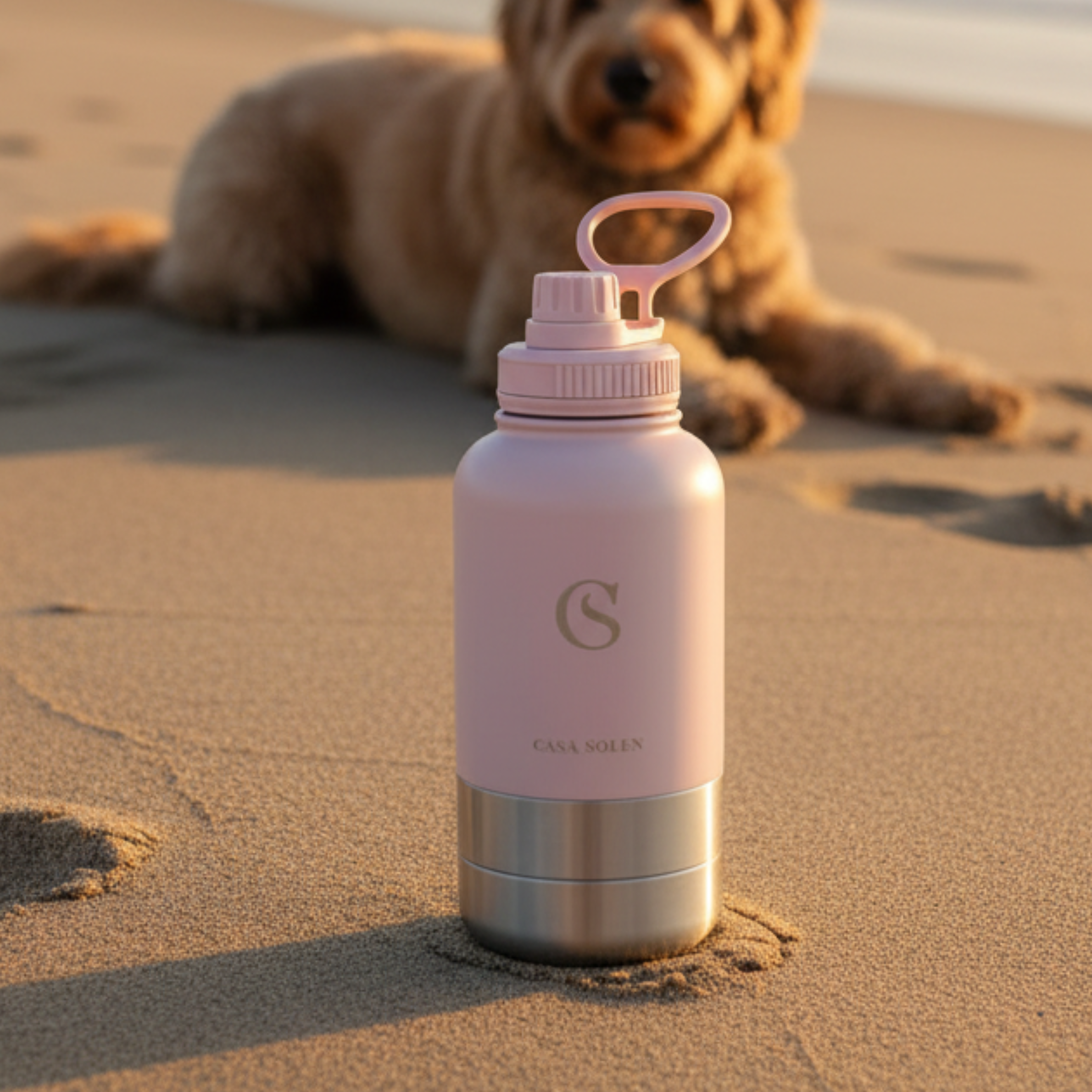 Powder blush pink pet travel flask with carry loop, front logo, and stainless bottom