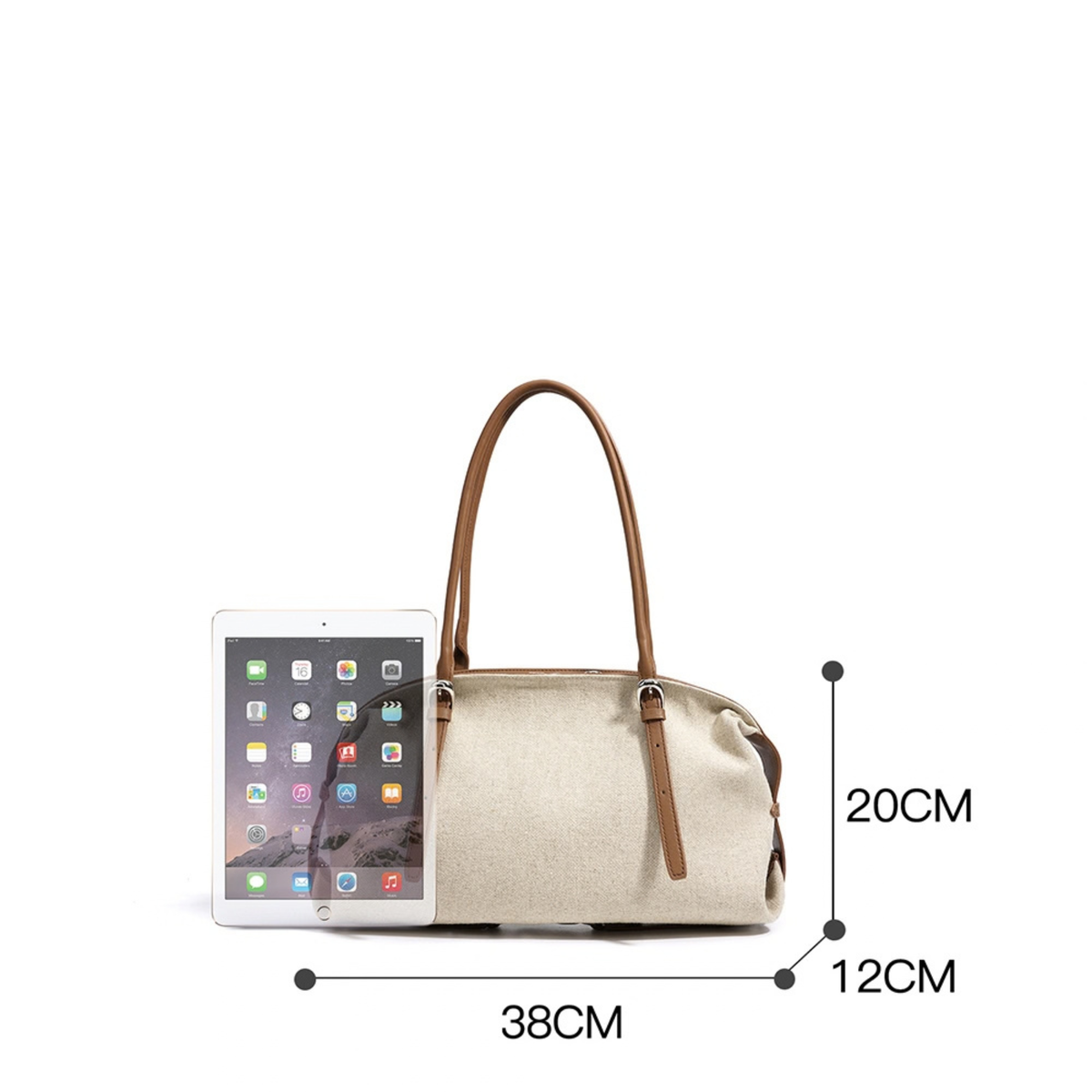 Oat canvas handbag with cognac leather handles, sized to hold a tablet