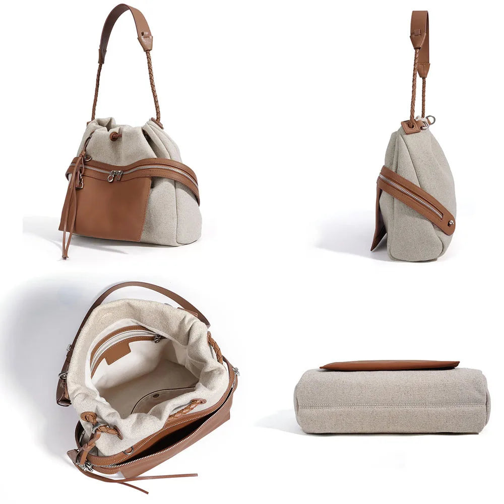 Two-tone bucket bag with drawstring and brown leather trim; open interior view