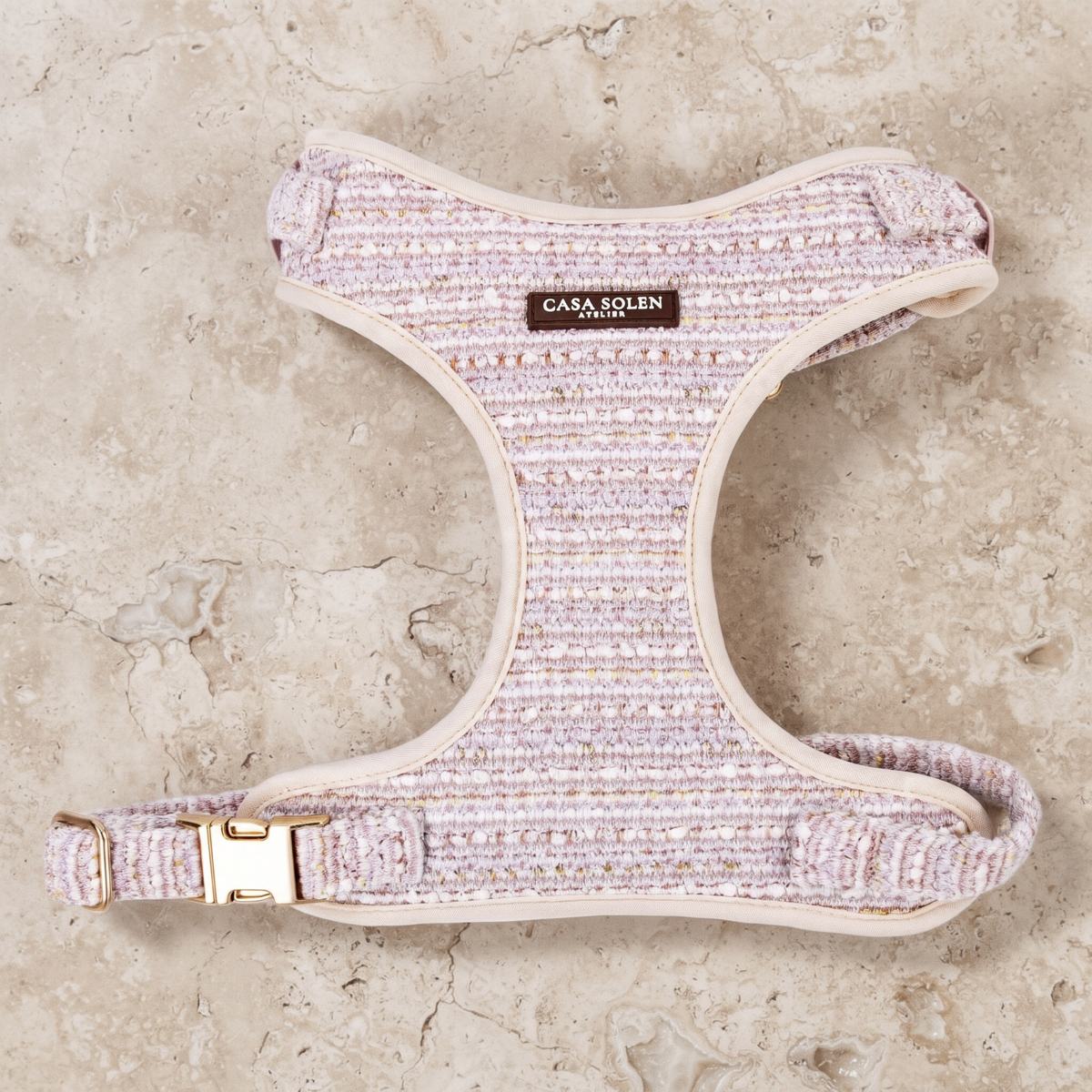Rosewater tweed dog harness with adjustable straps and gold buckles, beige trim.