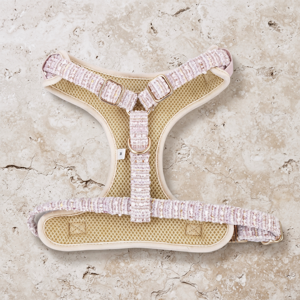 Rosewater tweed dog harness with adjustable chest straps and gold hardware.