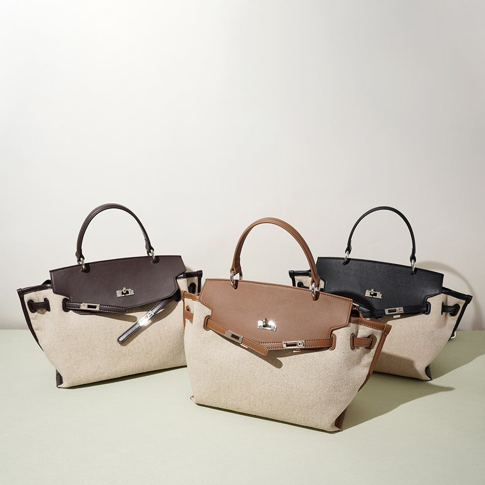 Leather handbags set with top handles, front flap, and metal clasp hardware